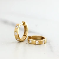 /public/photos/live/Round Cut Moissanite Small Huggie Hoop Earrings 917 (4).webp